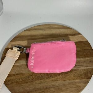 lululemon bright pink mini zip pouch with clip